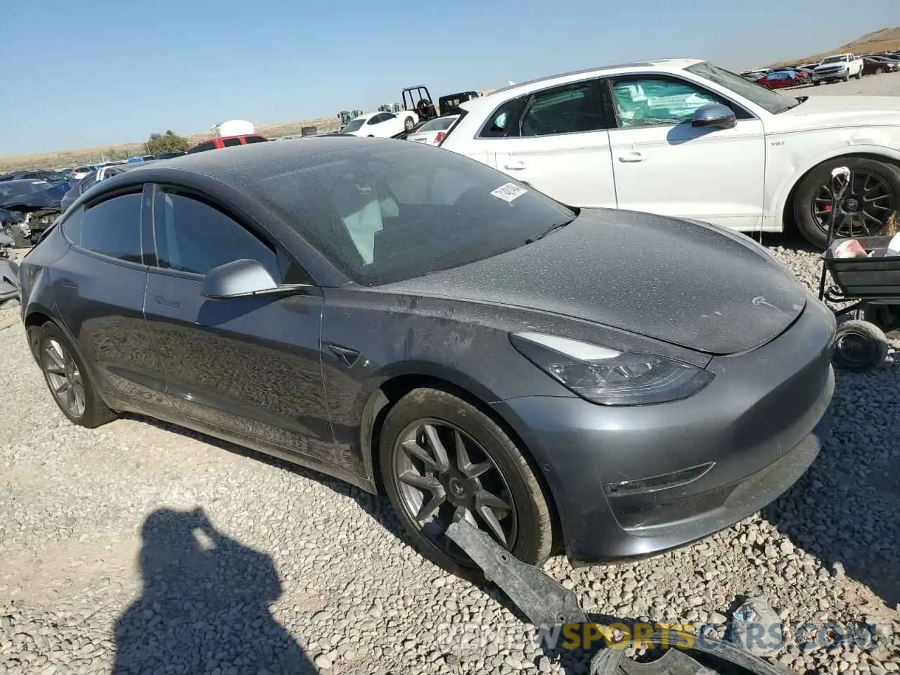 4 Photograph of a damaged car 5YJ3E1EB9NF158876 TESLA MODEL 3 2022