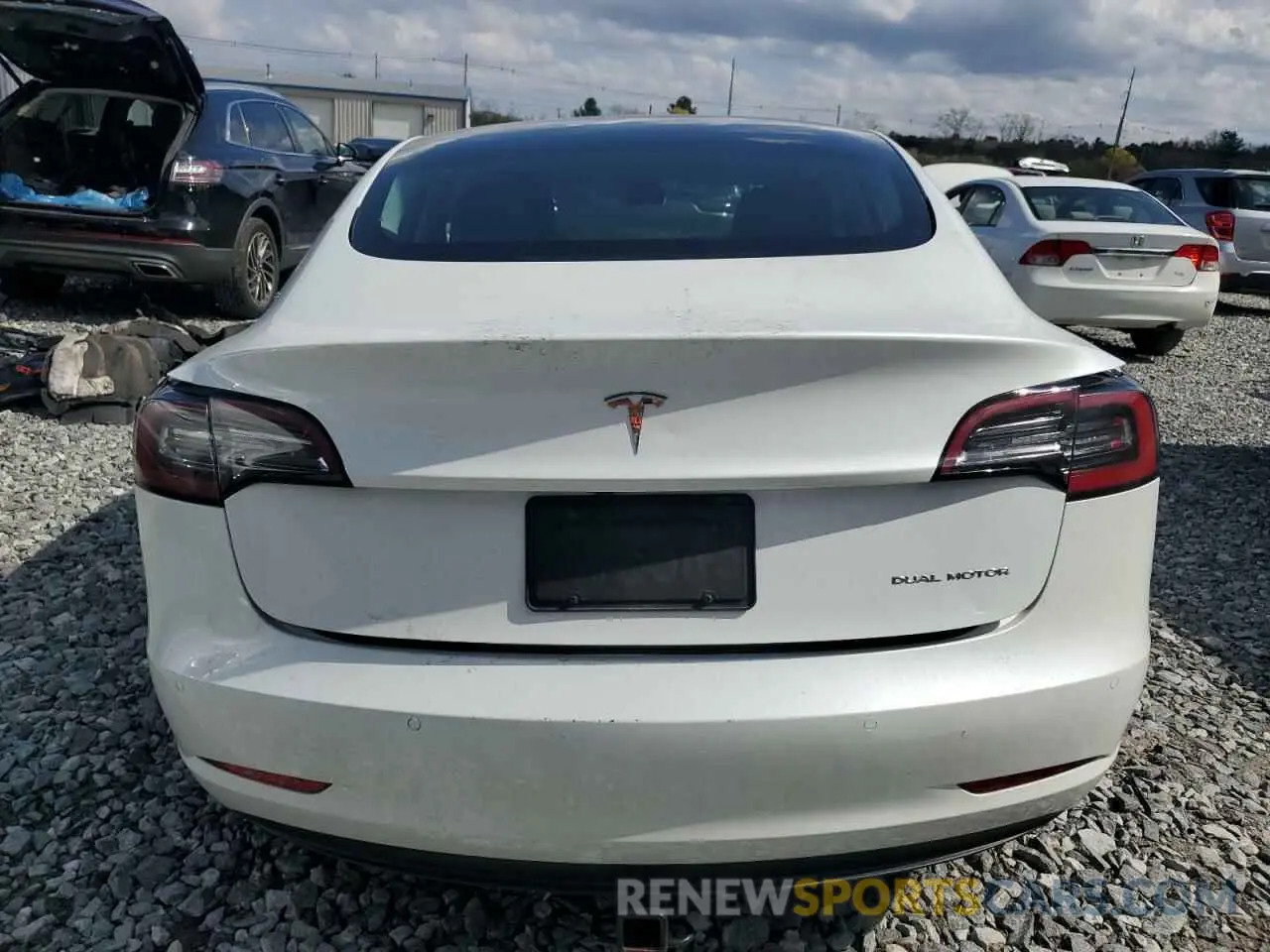 6 Photograph of a damaged car 5YJ3E1EB9NF159977 TESLA MODEL 3 2022
