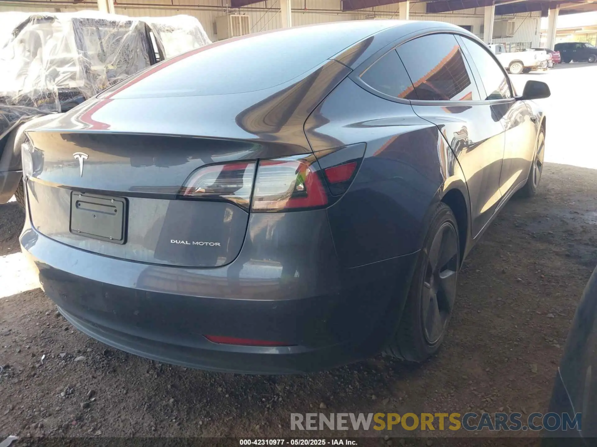 4 Photograph of a damaged car 5YJ3E1EB9NF167142 TESLA MODEL 3 2022