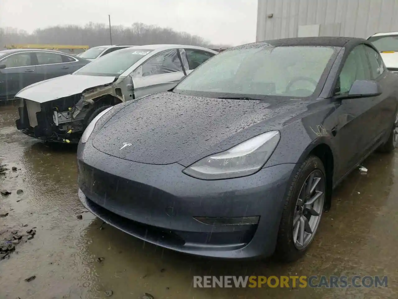 2 Photograph of a damaged car 5YJ3E1EB9NF167335 TESLA MODEL 3 2022