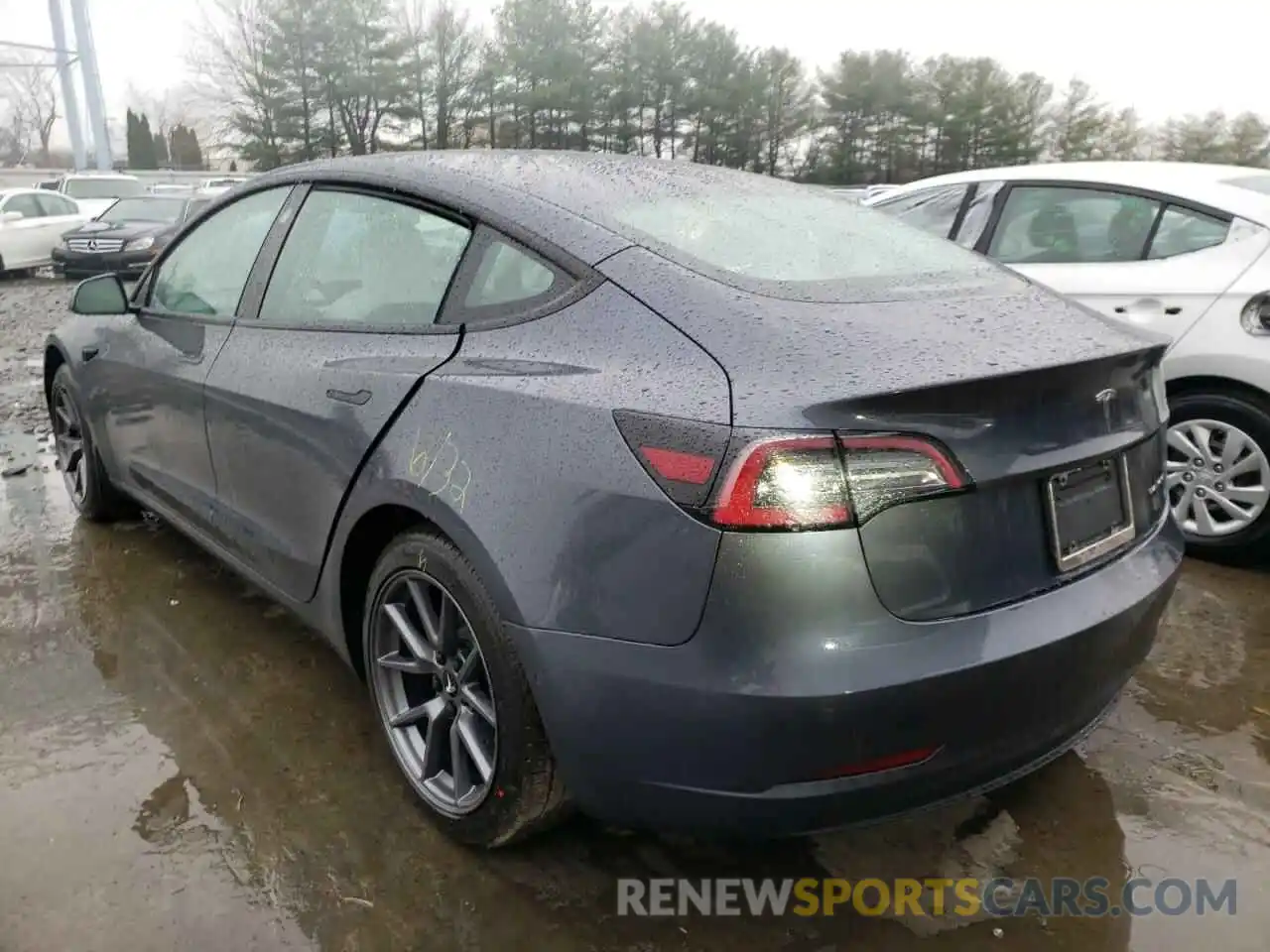 3 Photograph of a damaged car 5YJ3E1EB9NF167335 TESLA MODEL 3 2022