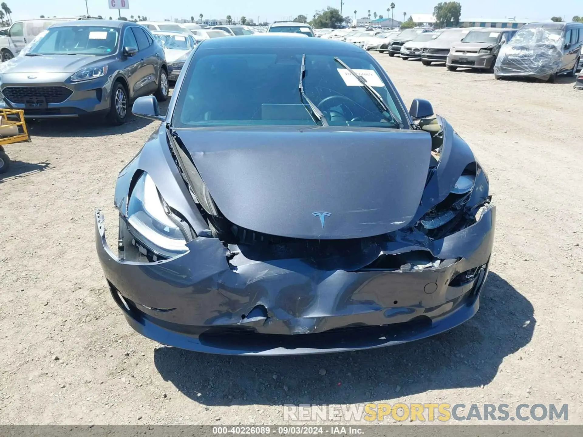 12 Photograph of a damaged car 5YJ3E1EB9NF184247 TESLA MODEL 3 2022