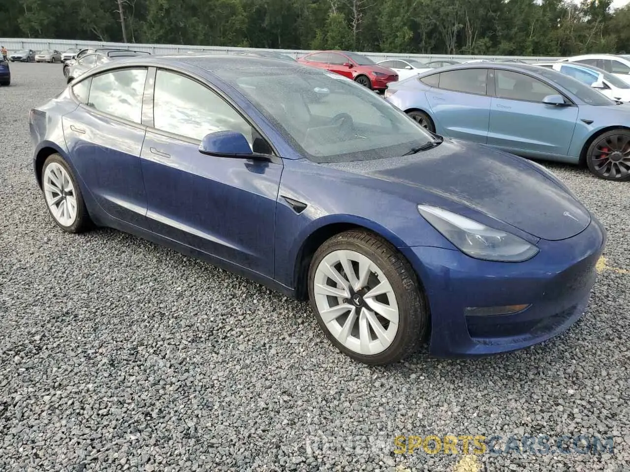 4 Photograph of a damaged car 5YJ3E1EB9NF184295 TESLA MODEL 3 2022