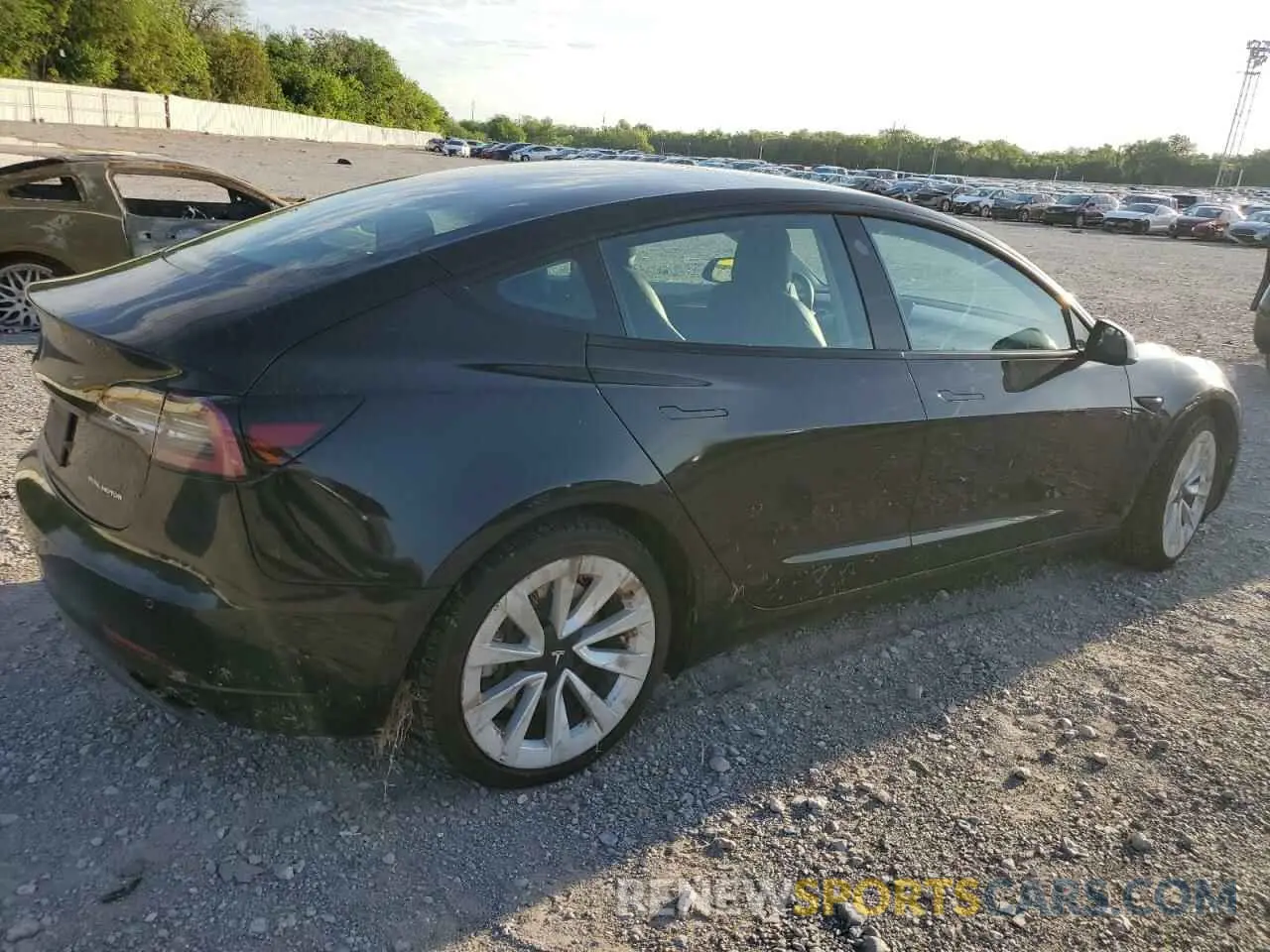 3 Photograph of a damaged car 5YJ3E1EB9NF189805 TESLA MODEL 3 2022