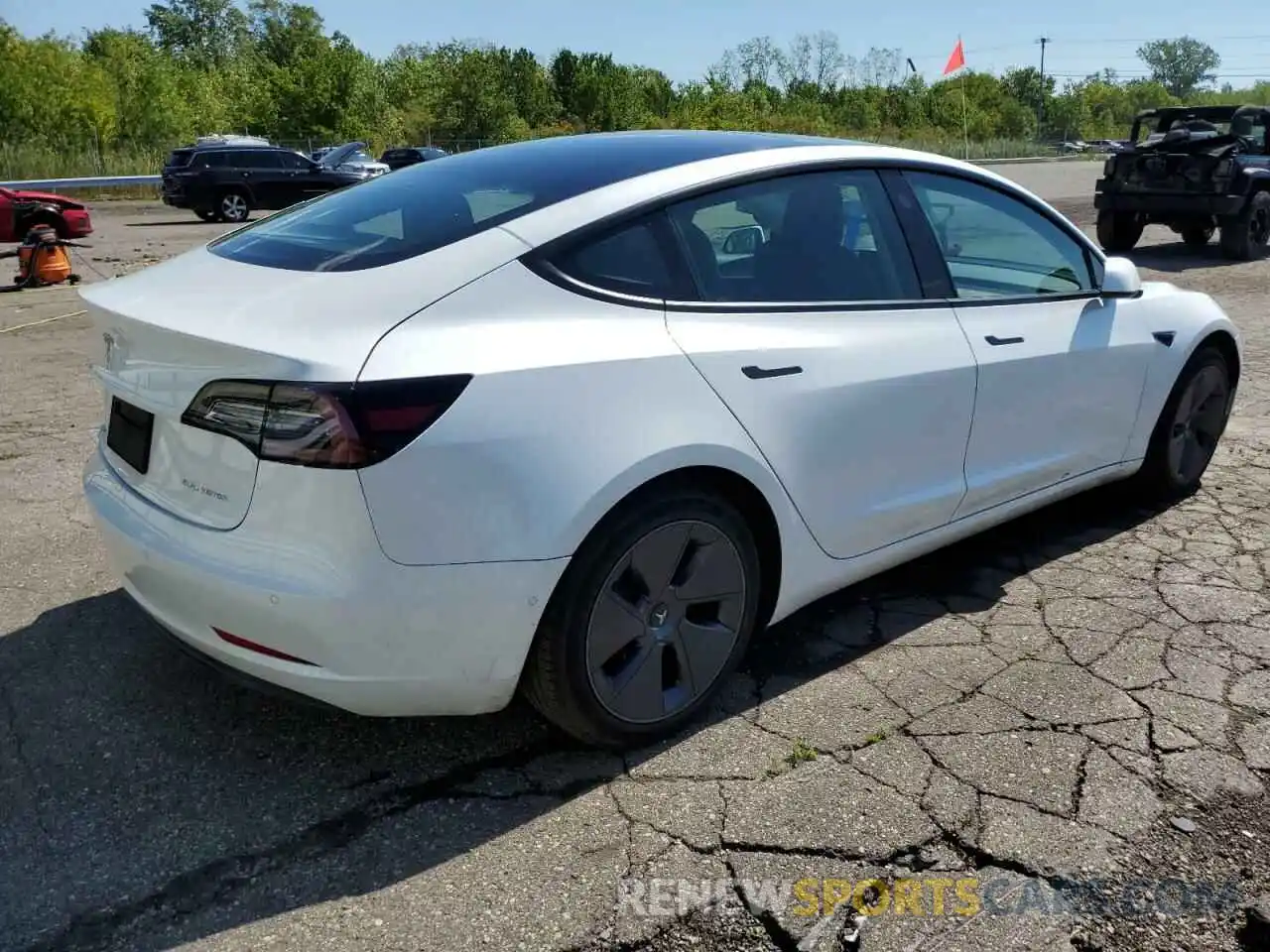 4 Photograph of a damaged car 5YJ3E1EB9NF191585 TESLA MODEL 3 2022