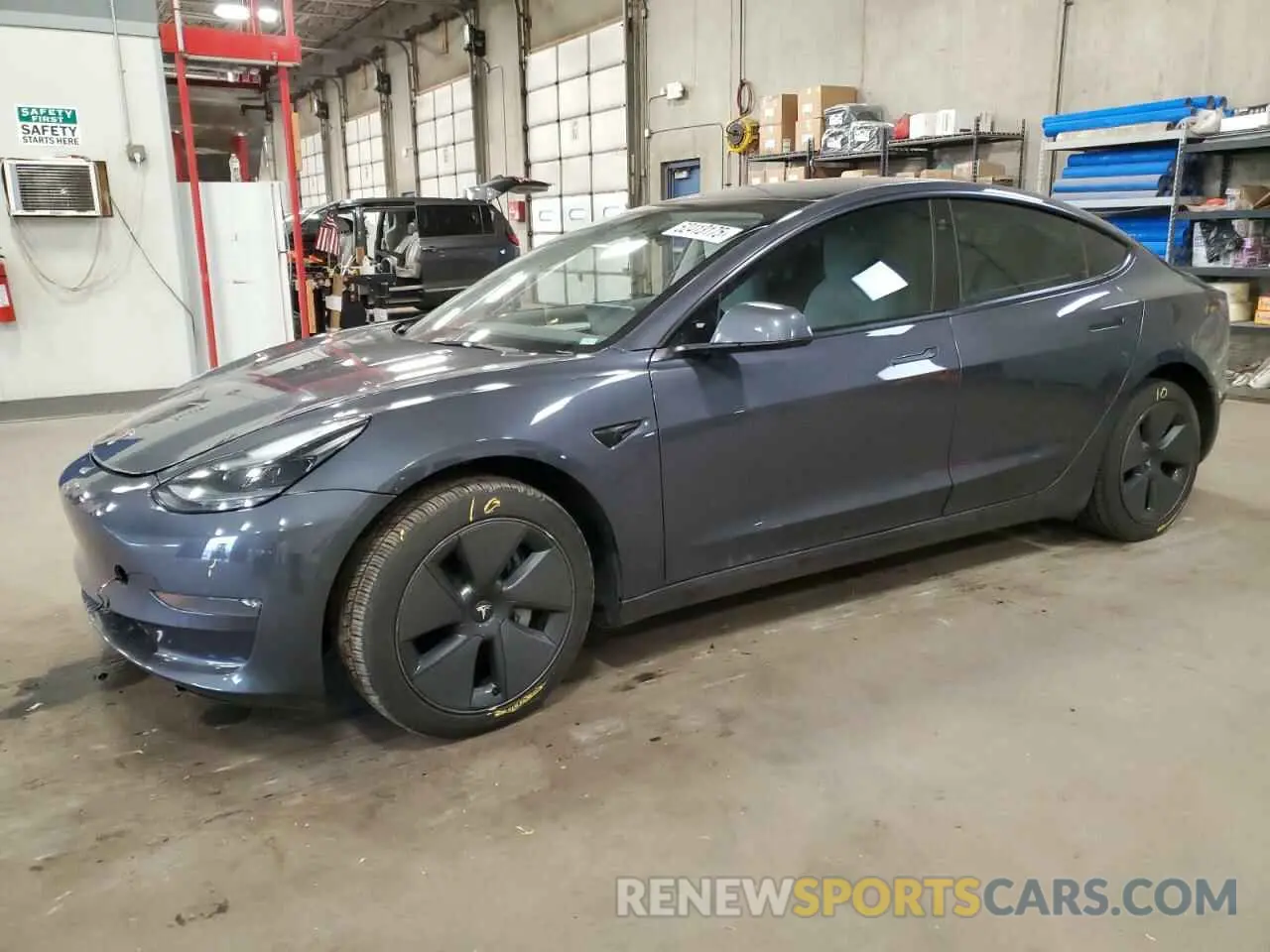1 Photograph of a damaged car 5YJ3E1EB9NF199184 TESLA MODEL 3 2022