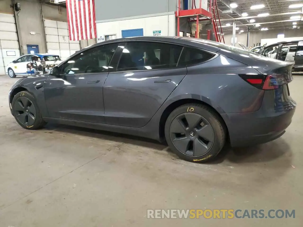 2 Photograph of a damaged car 5YJ3E1EB9NF199184 TESLA MODEL 3 2022