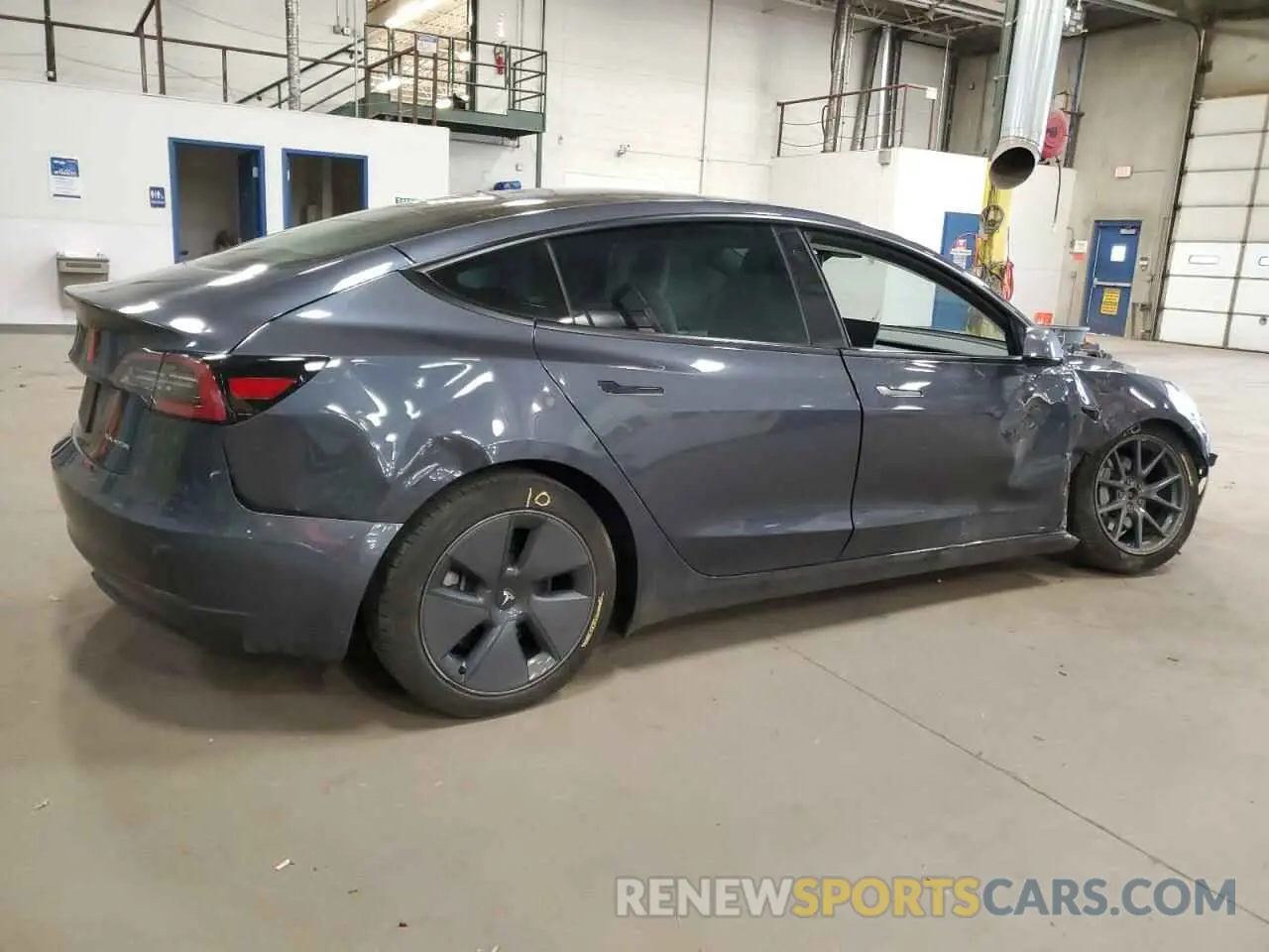 3 Photograph of a damaged car 5YJ3E1EB9NF199184 TESLA MODEL 3 2022