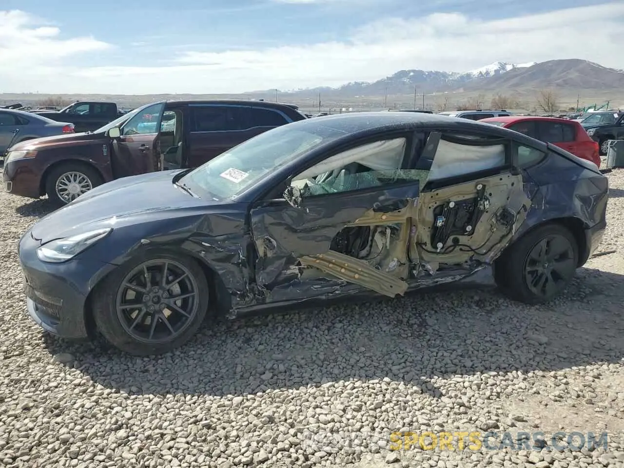 1 Photograph of a damaged car 5YJ3E1EB9NF201144 TESLA MODEL 3 2022