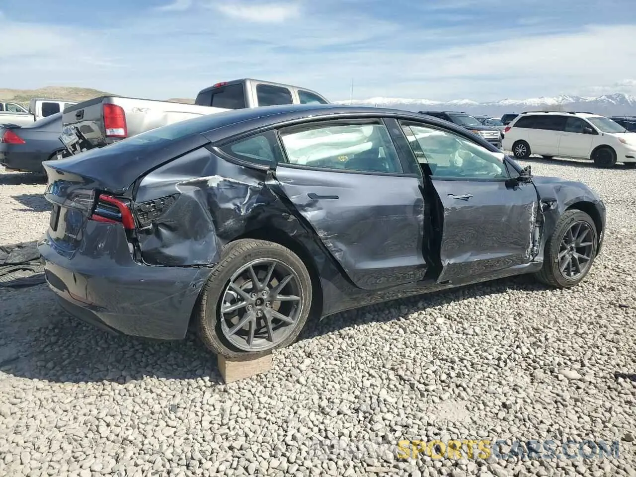 3 Photograph of a damaged car 5YJ3E1EB9NF201144 TESLA MODEL 3 2022