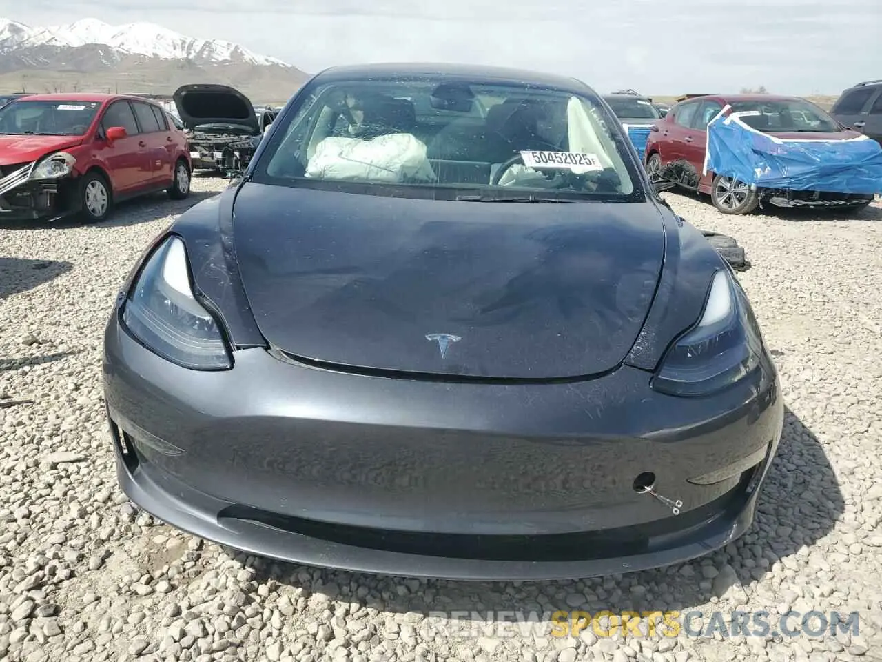 5 Photograph of a damaged car 5YJ3E1EB9NF201144 TESLA MODEL 3 2022