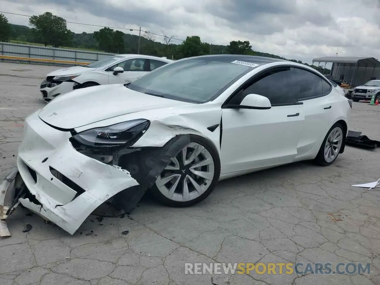 1 Photograph of a damaged car 5YJ3E1EB9NF203489 TESLA MODEL 3 2022