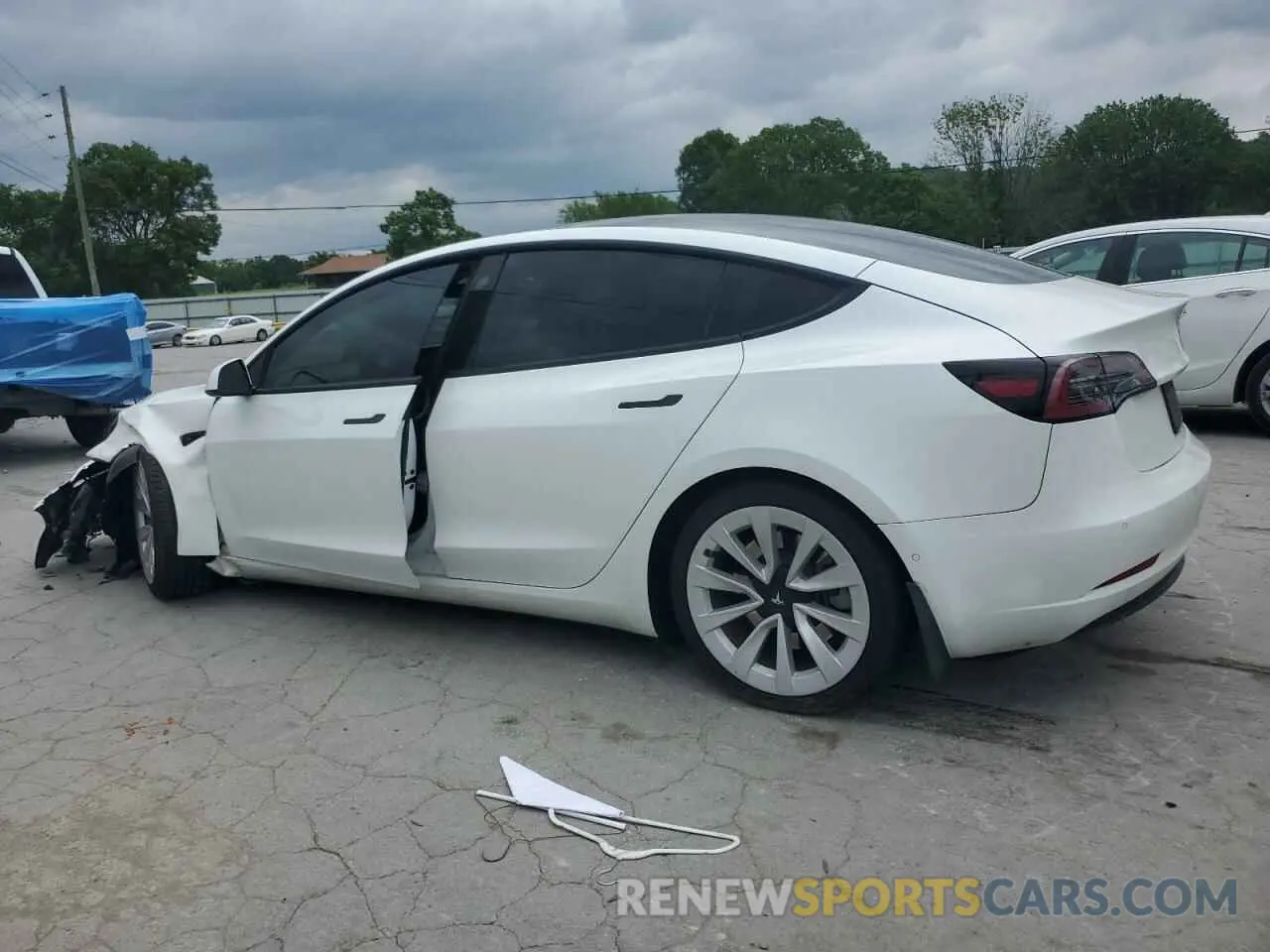 2 Photograph of a damaged car 5YJ3E1EB9NF203489 TESLA MODEL 3 2022