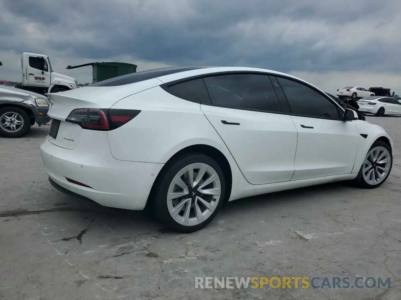 3 Photograph of a damaged car 5YJ3E1EB9NF203489 TESLA MODEL 3 2022