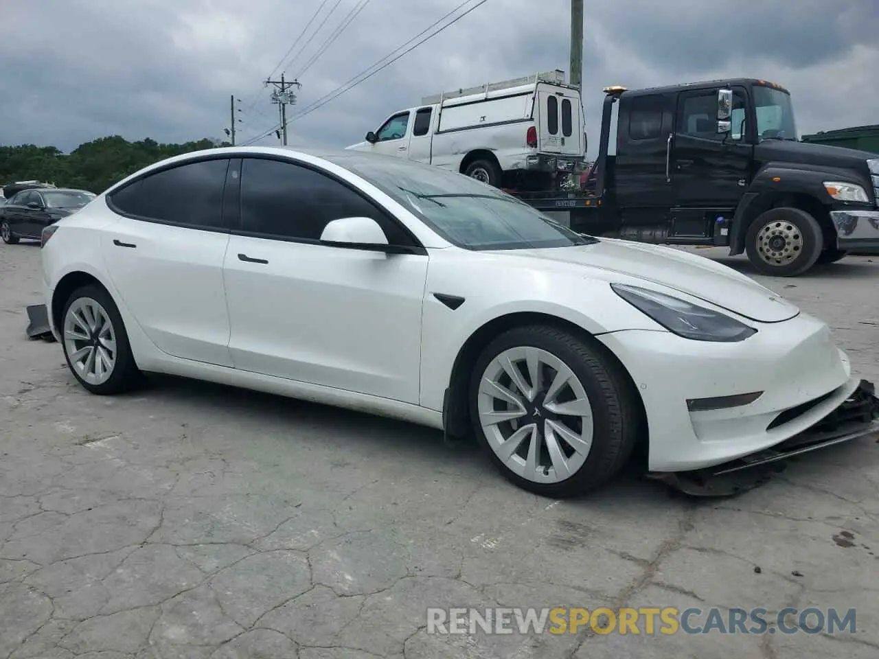 4 Photograph of a damaged car 5YJ3E1EB9NF203489 TESLA MODEL 3 2022