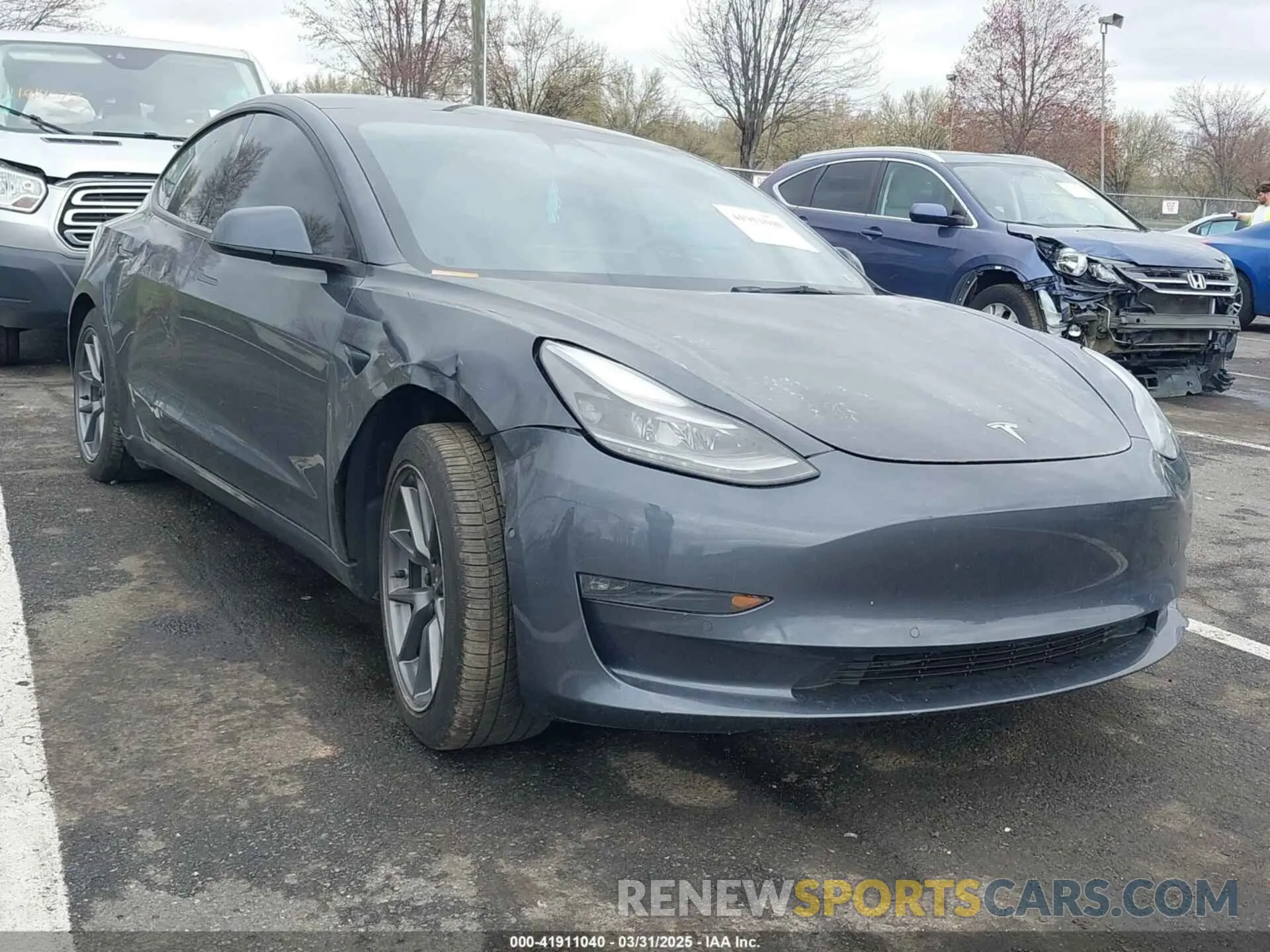 1 Photograph of a damaged car 5YJ3E1EB9NF206943 TESLA MODEL 3 2022