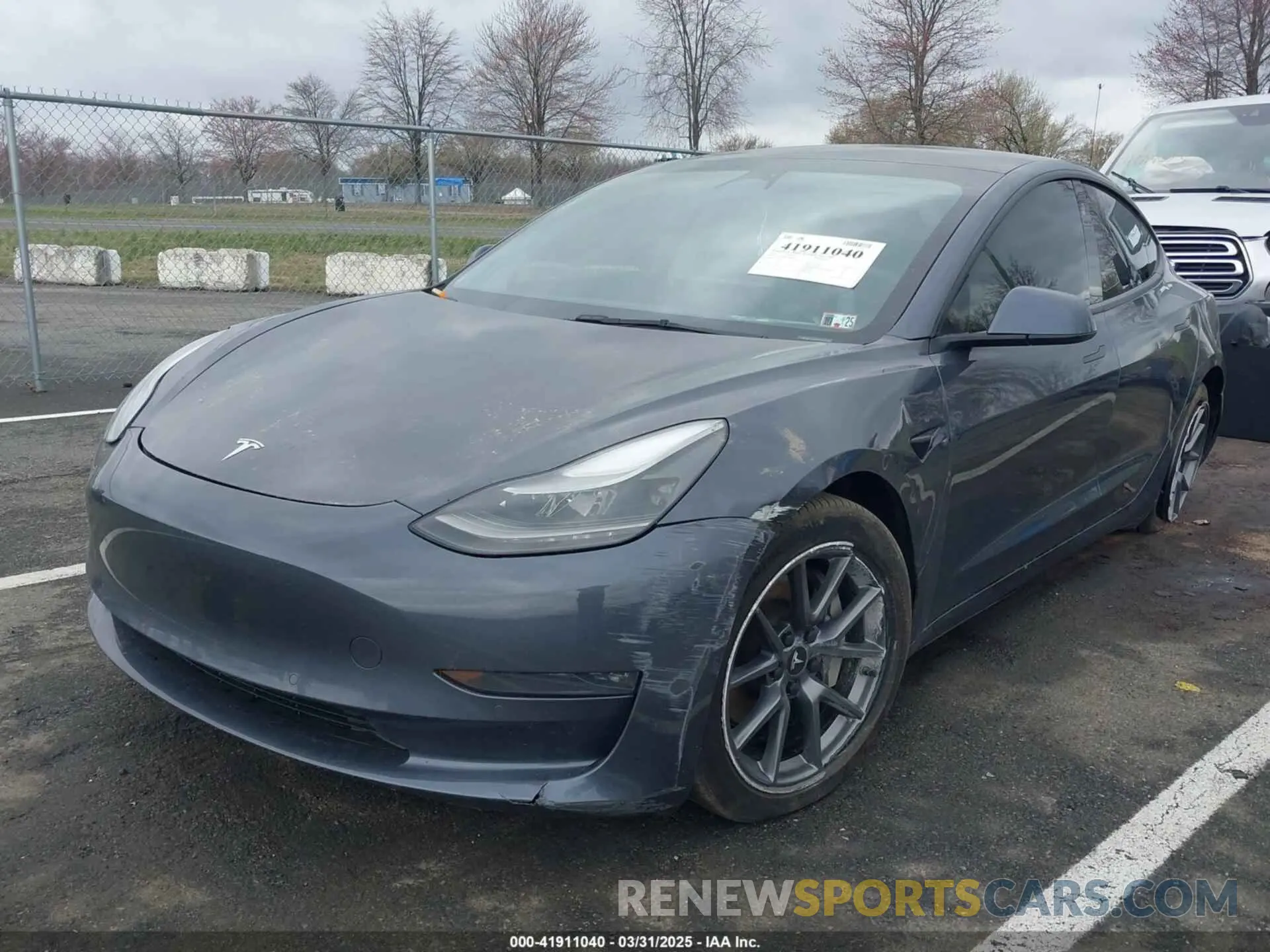 2 Photograph of a damaged car 5YJ3E1EB9NF206943 TESLA MODEL 3 2022