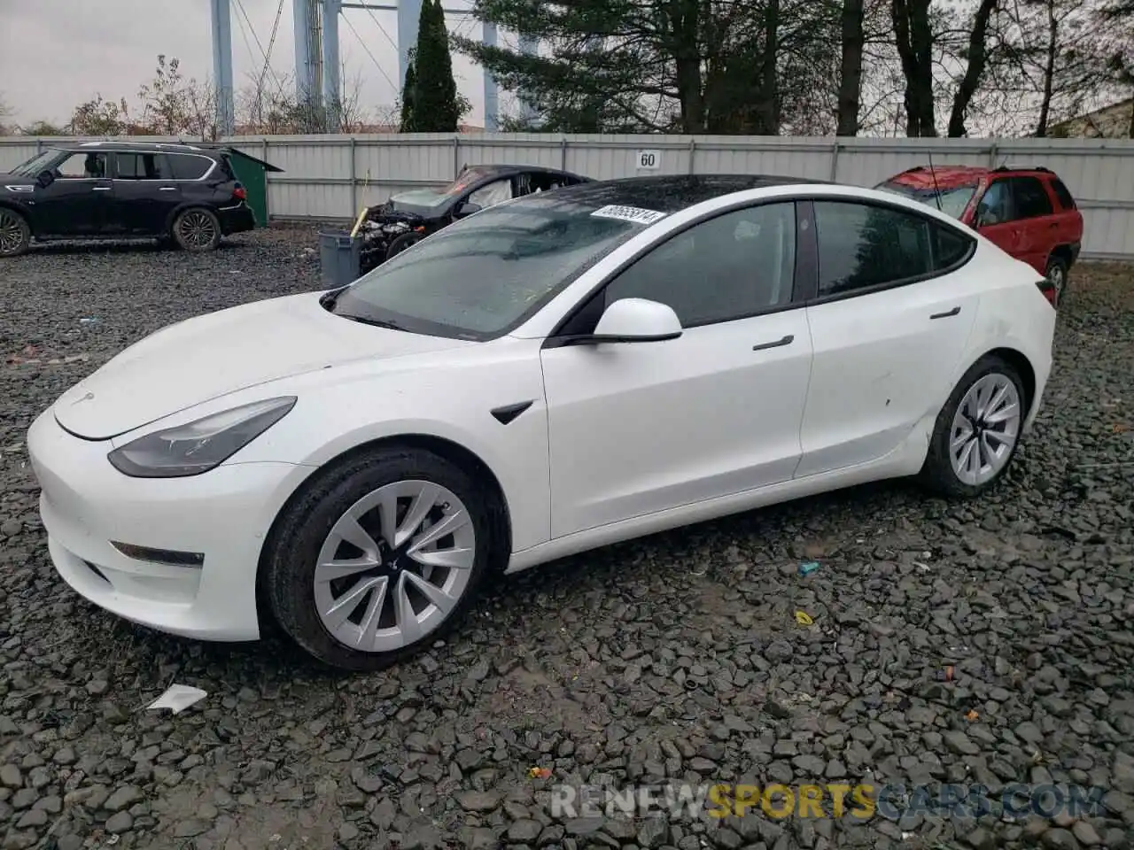 1 Photograph of a damaged car 5YJ3E1EB9NF209339 TESLA MODEL 3 2022