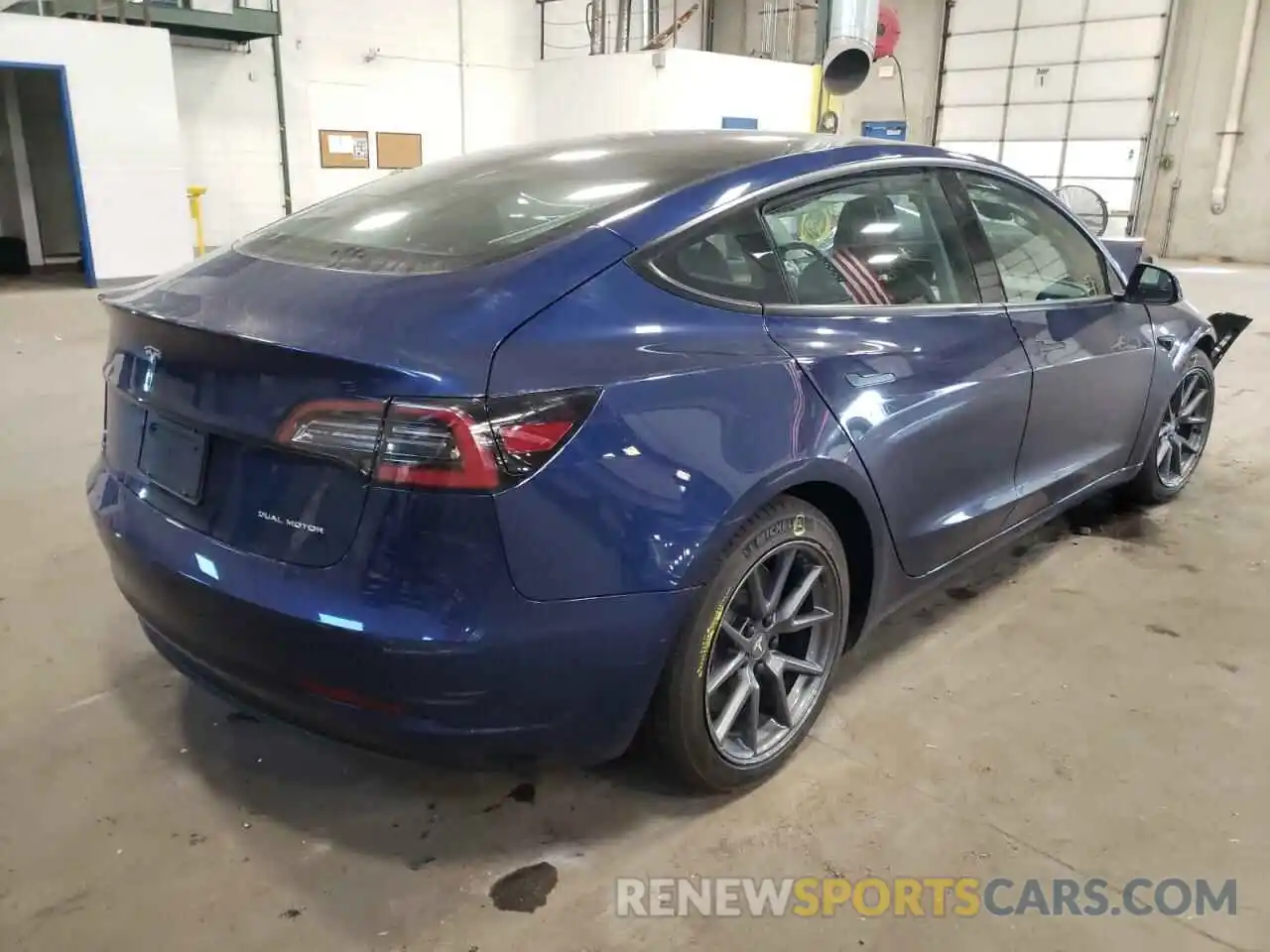 4 Photograph of a damaged car 5YJ3E1EB9NF227100 TESLA MODEL 3 2022