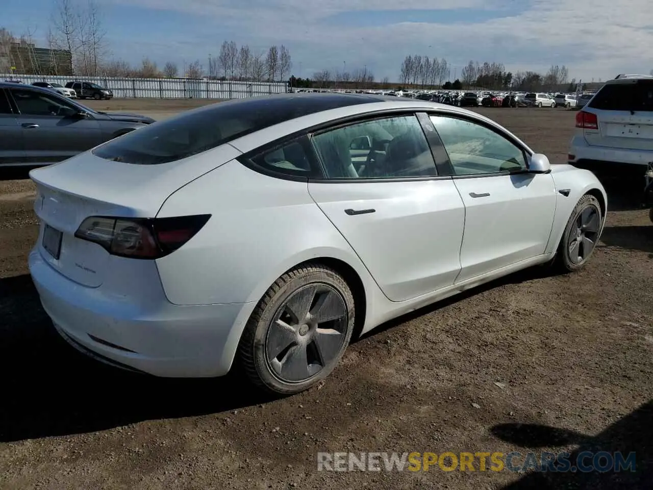 3 Photograph of a damaged car 5YJ3E1EB9NF239876 TESLA MODEL 3 2022
