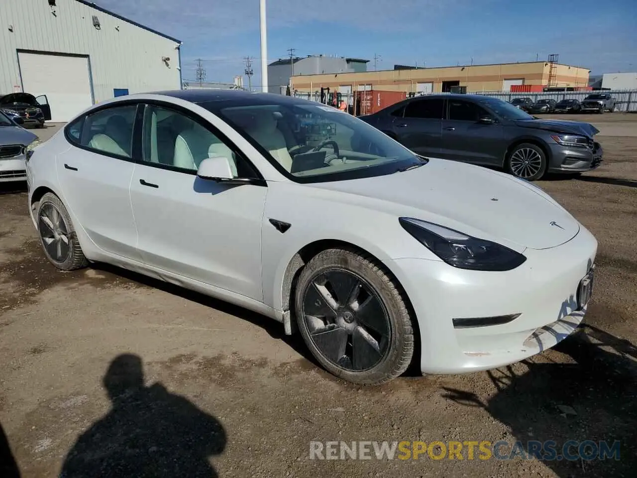 4 Photograph of a damaged car 5YJ3E1EB9NF239876 TESLA MODEL 3 2022