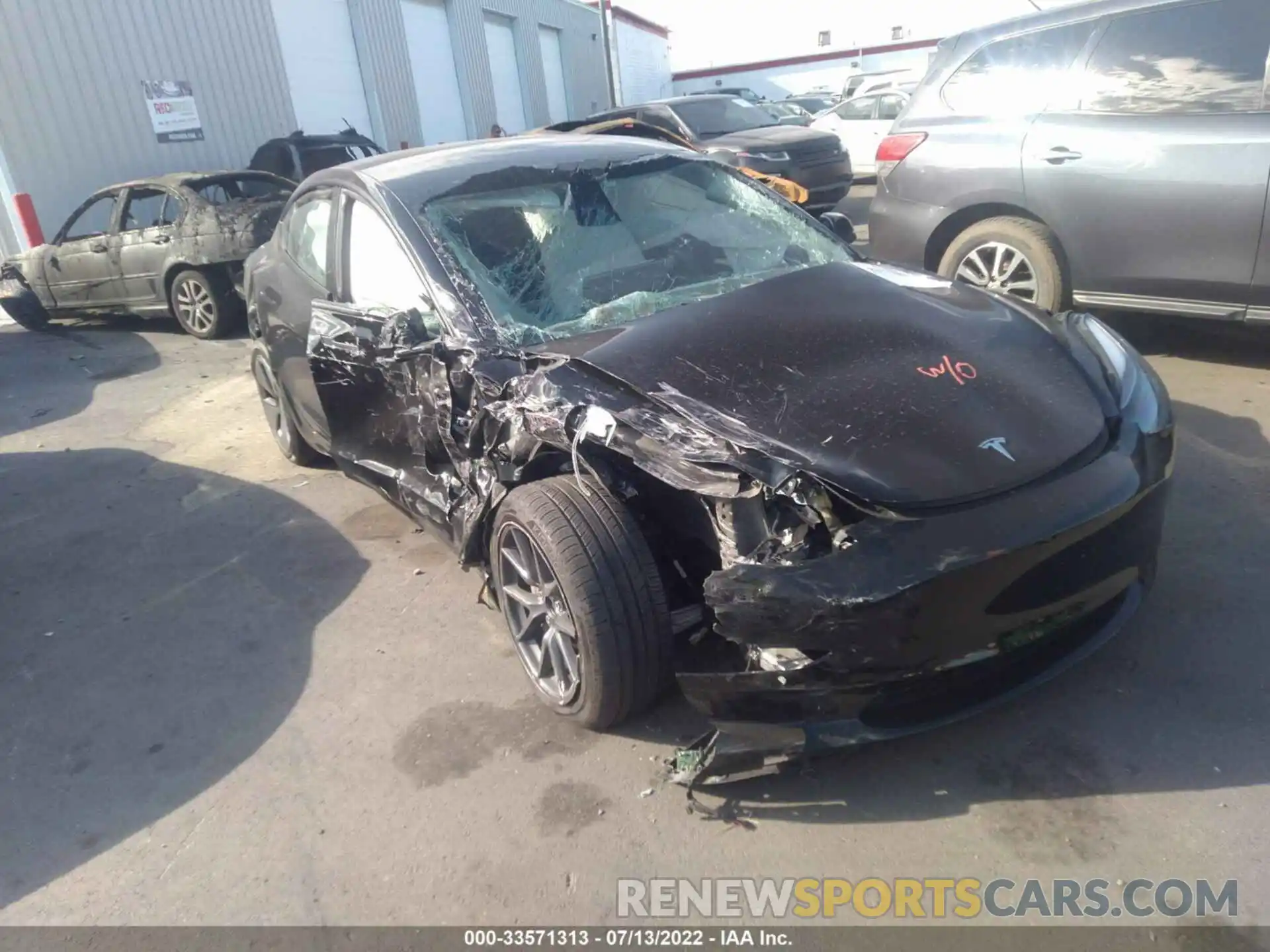 1 Photograph of a damaged car 5YJ3E1EB9NF240705 TESLA MODEL 3 2022