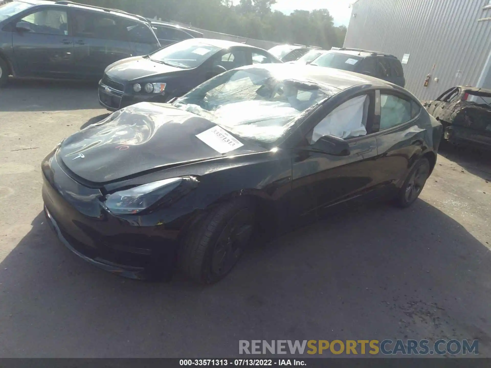 2 Photograph of a damaged car 5YJ3E1EB9NF240705 TESLA MODEL 3 2022