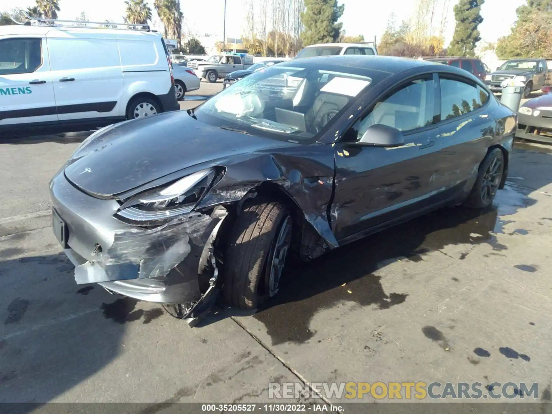 2 Photograph of a damaged car 5YJ3E1EB9NF242535 TESLA MODEL 3 2022