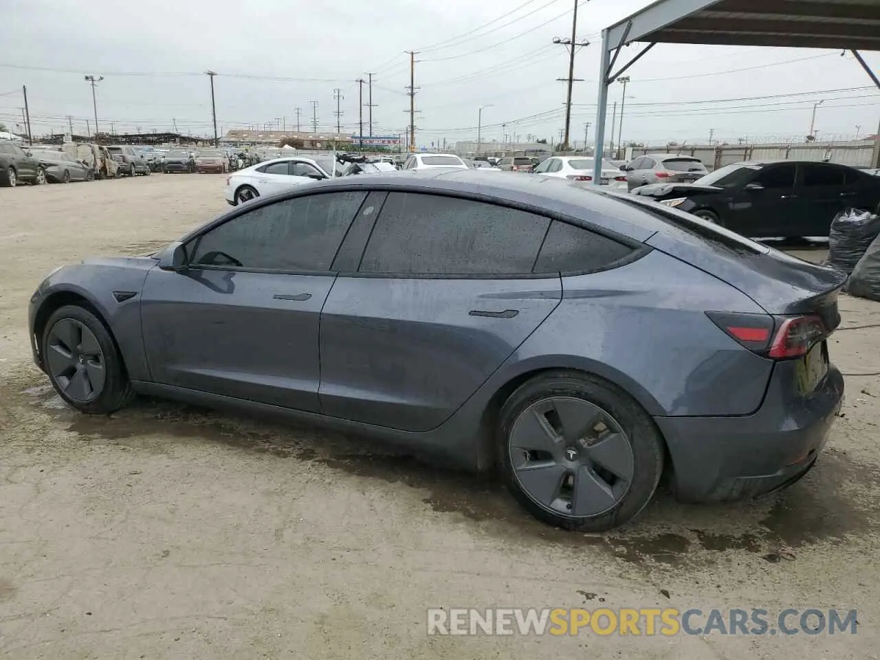2 Photograph of a damaged car 5YJ3E1EB9NF258816 TESLA MODEL 3 2022