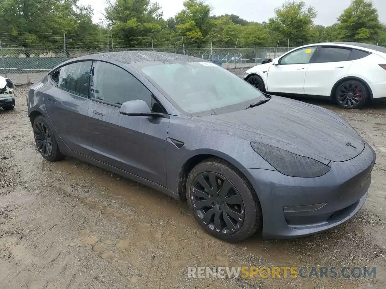 4 Photograph of a damaged car 5YJ3E1EB9NF262364 TESLA MODEL 3 2022