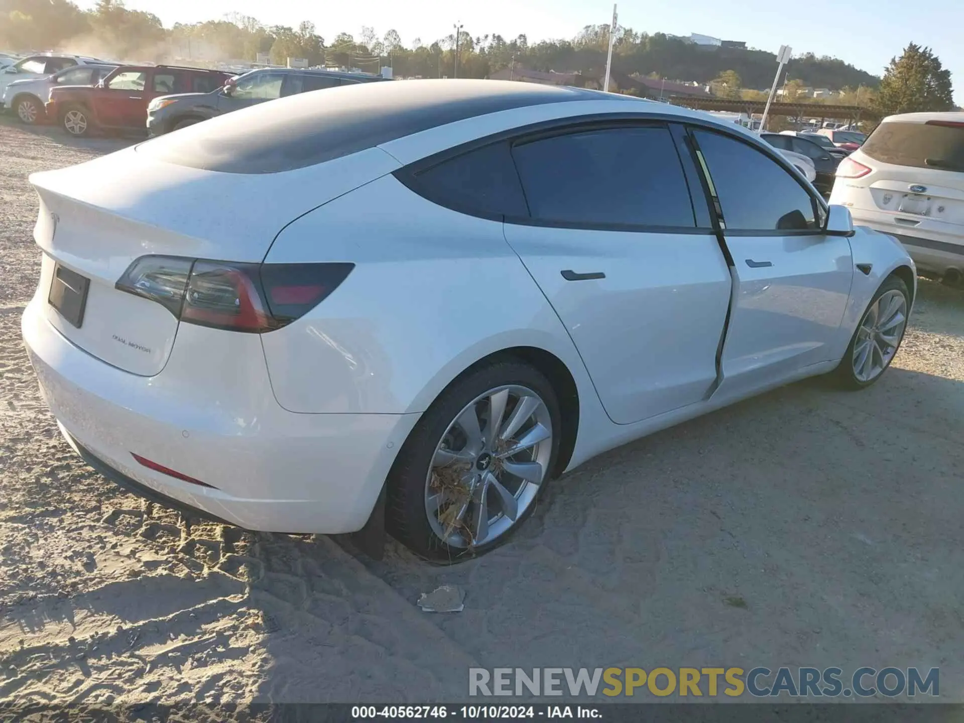 4 Photograph of a damaged car 5YJ3E1EB9NF263997 TESLA MODEL 3 2022