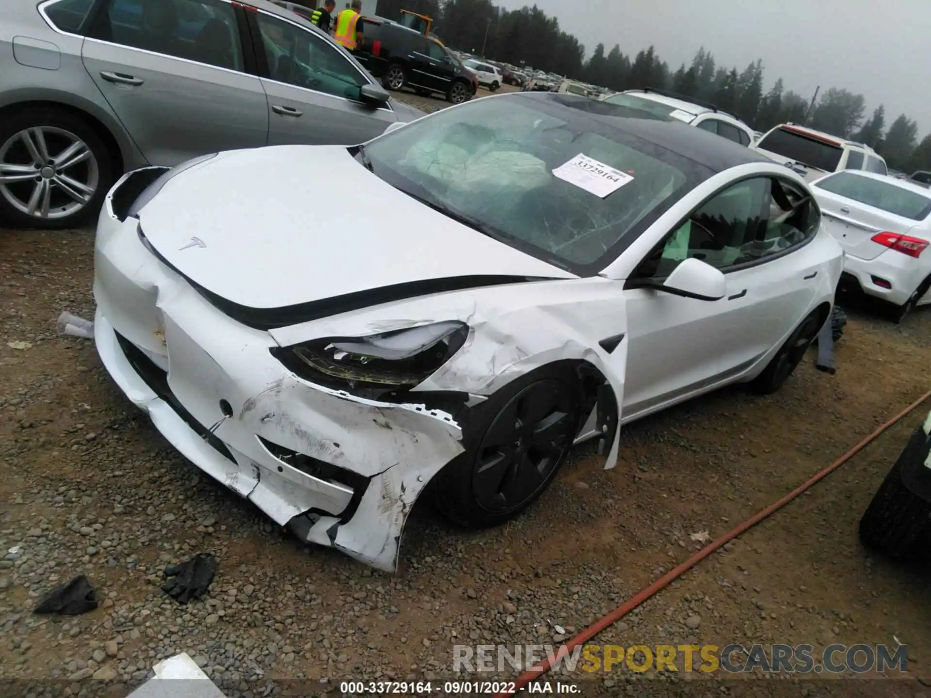 2 Photograph of a damaged car 5YJ3E1EB9NF267550 TESLA MODEL 3 2022