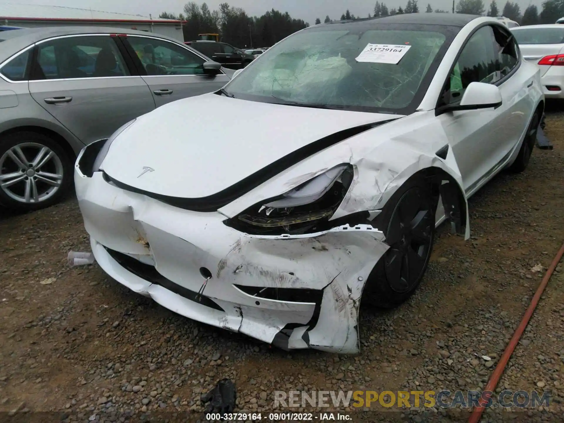 6 Photograph of a damaged car 5YJ3E1EB9NF267550 TESLA MODEL 3 2022