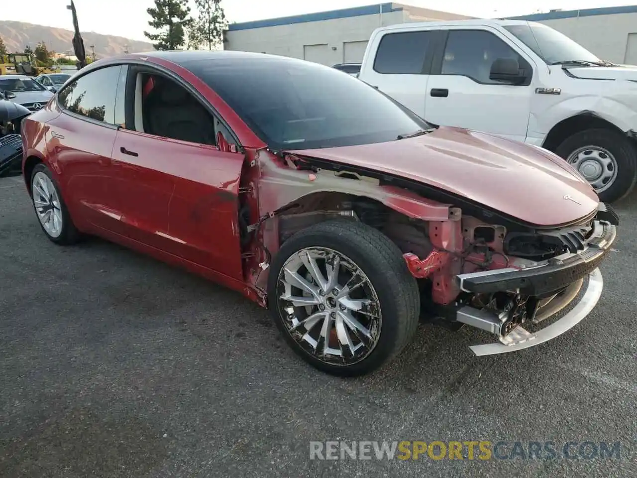 4 Photograph of a damaged car 5YJ3E1EB9NF276863 TESLA MODEL 3 2022