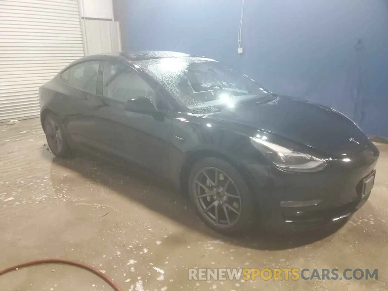 4 Photograph of a damaged car 5YJ3E1EB9NF287460 TESLA MODEL 3 2022