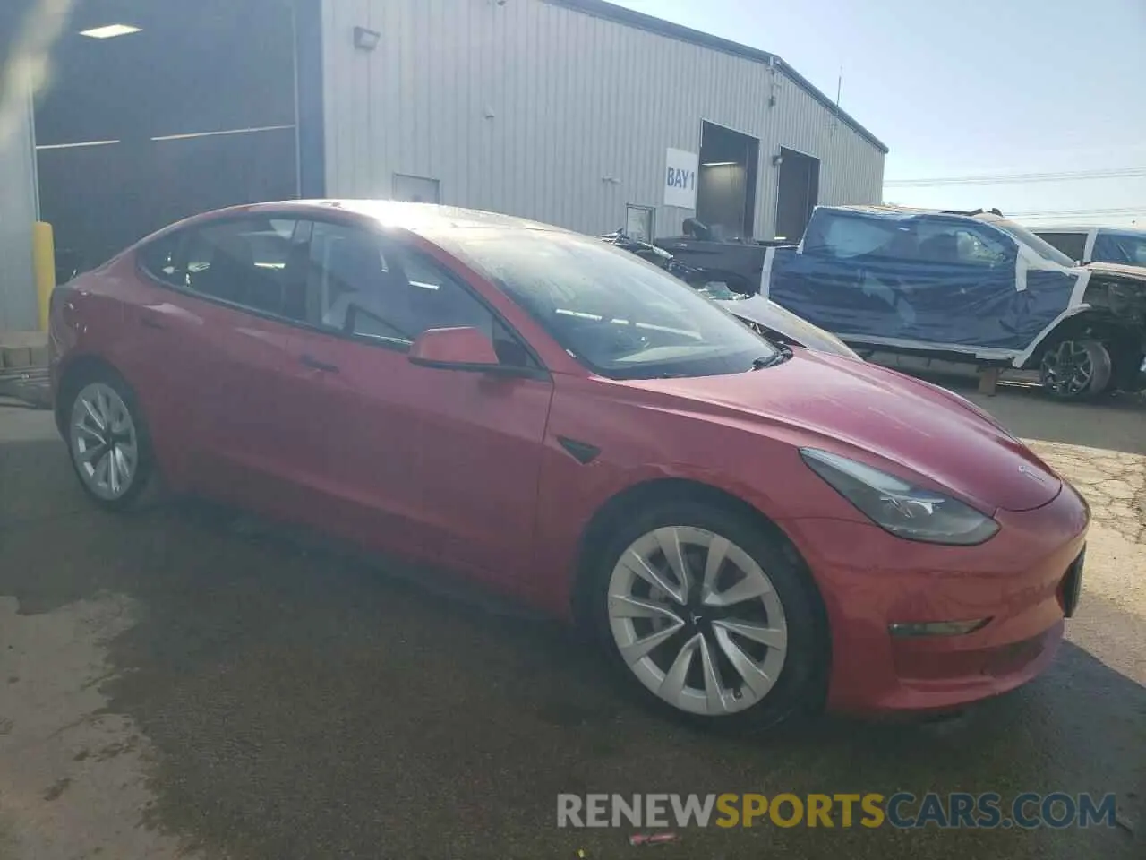 4 Photograph of a damaged car 5YJ3E1EB9NF289855 TESLA MODEL 3 2022
