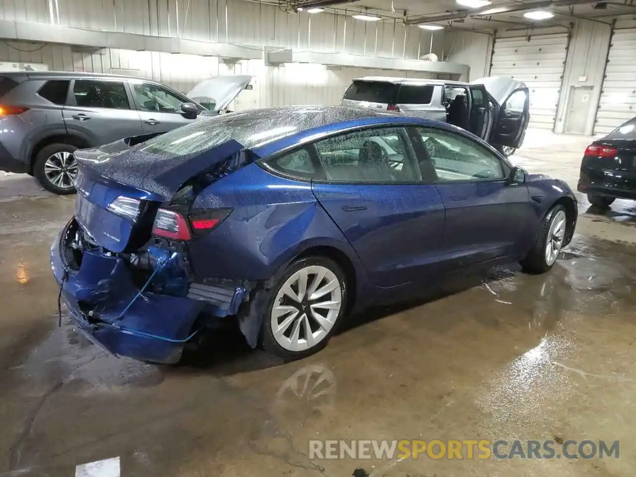 3 Photograph of a damaged car 5YJ3E1EB9NF305214 TESLA MODEL 3 2022