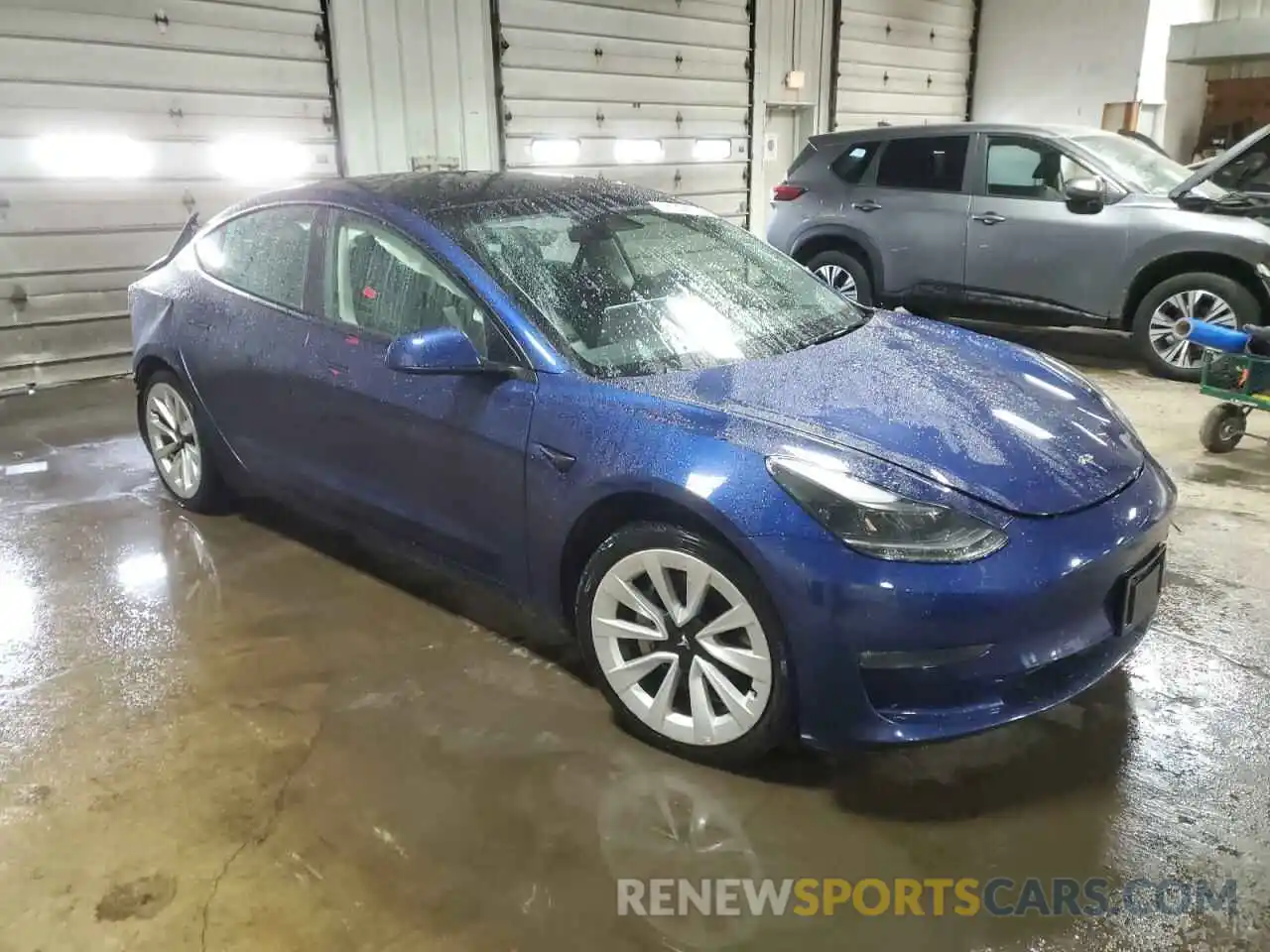 4 Photograph of a damaged car 5YJ3E1EB9NF305214 TESLA MODEL 3 2022