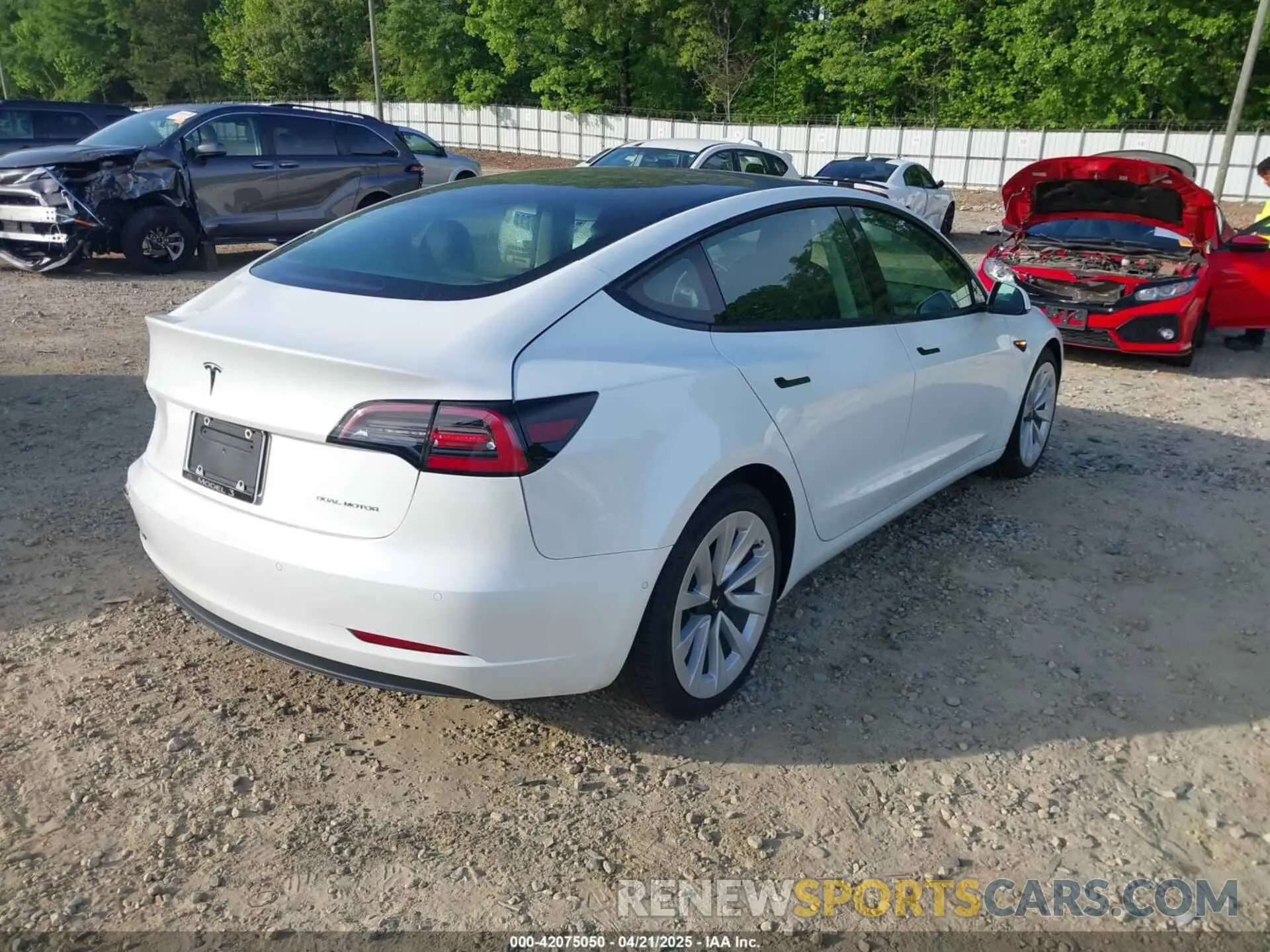 4 Photograph of a damaged car 5YJ3E1EB9NF321073 TESLA MODEL 3 2022
