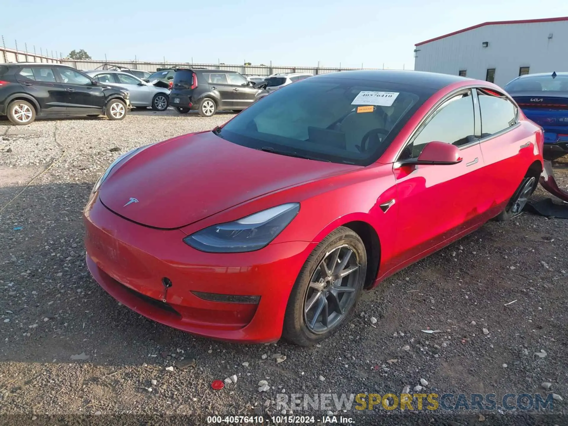 2 Photograph of a damaged car 5YJ3E1EB9NF323180 TESLA MODEL 3 2022