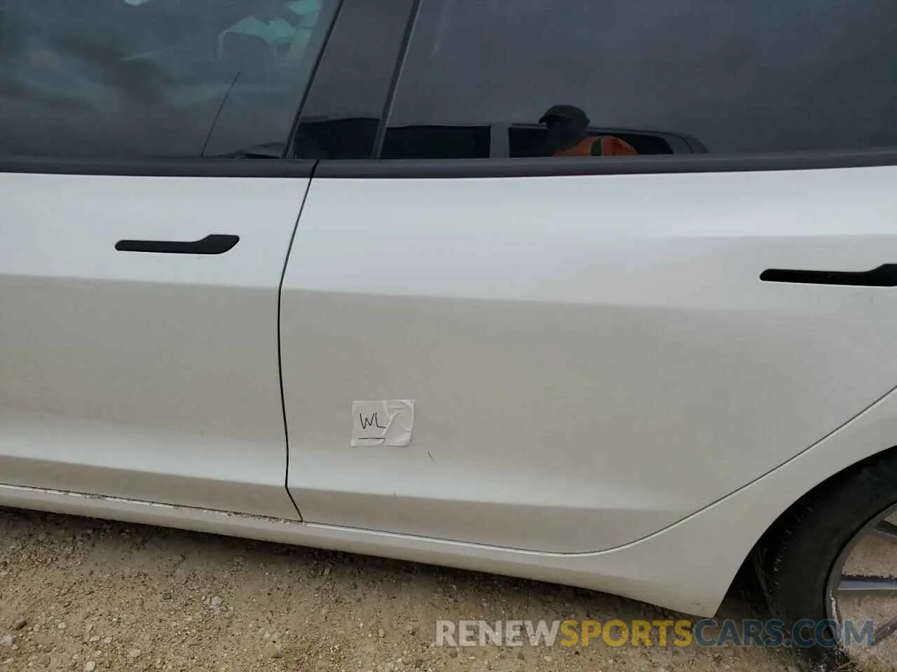 12 Photograph of a damaged car 5YJ3E1EB9NF325799 TESLA MODEL 3 2022