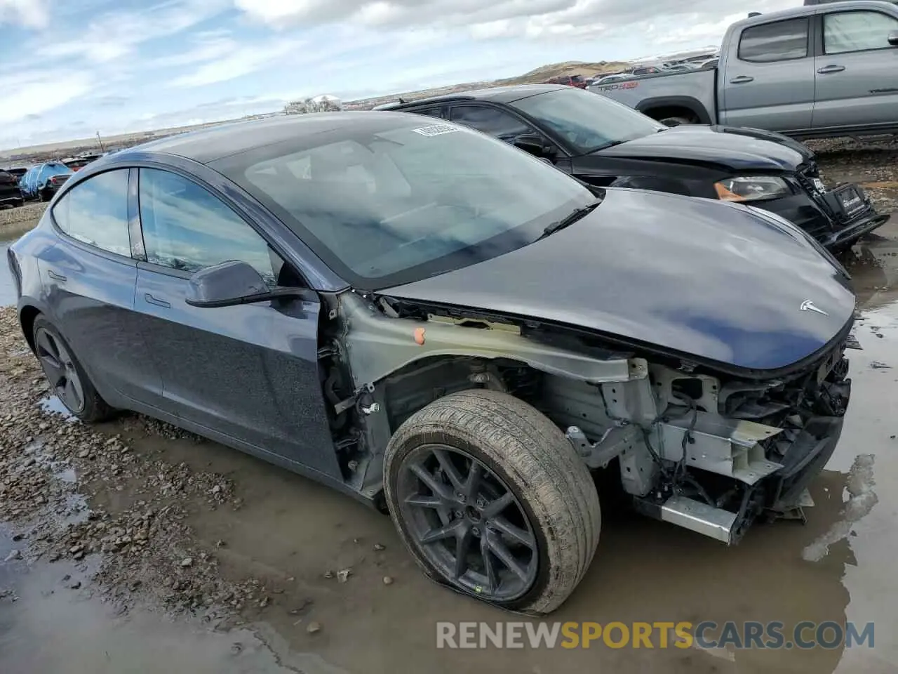 4 Photograph of a damaged car 5YJ3E1EB9NF327066 TESLA MODEL 3 2022