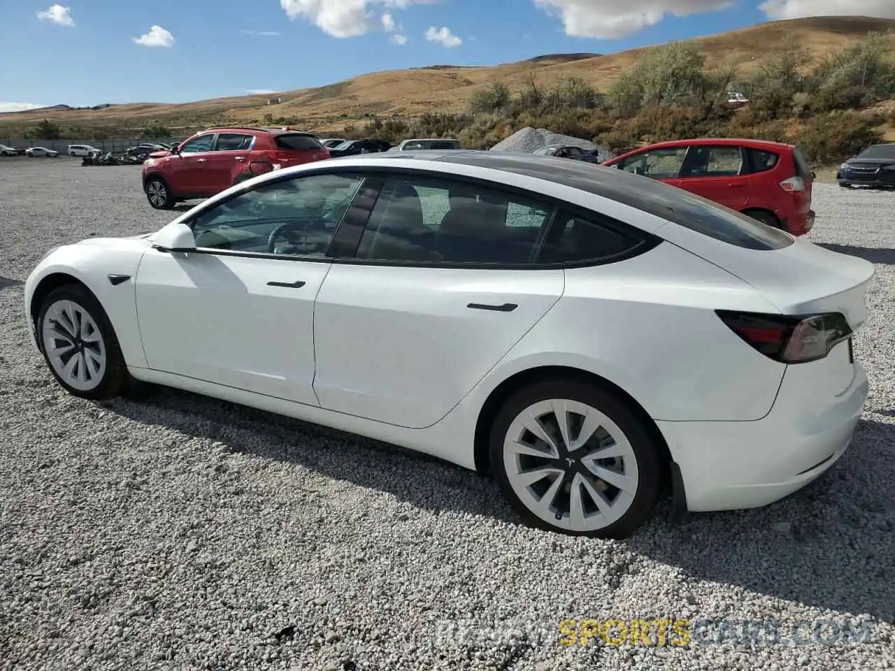 2 Photograph of a damaged car 5YJ3E1EB9NF328413 TESLA MODEL 3 2022