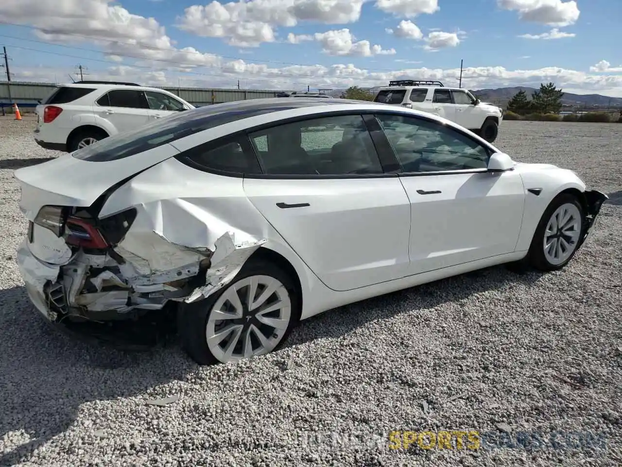 3 Photograph of a damaged car 5YJ3E1EB9NF328413 TESLA MODEL 3 2022