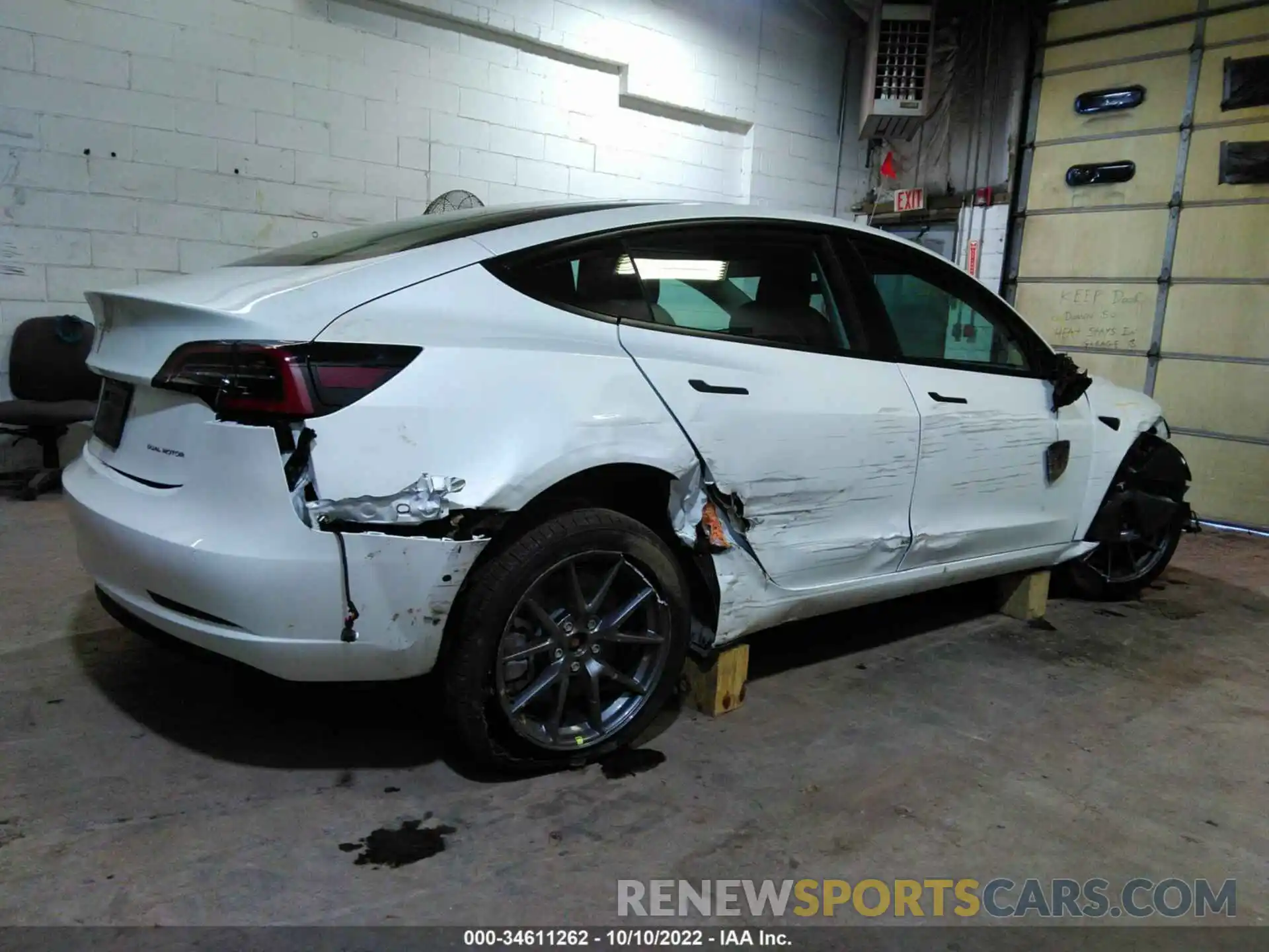 6 Photograph of a damaged car 5YJ3E1EB9NF328539 TESLA MODEL 3 2022