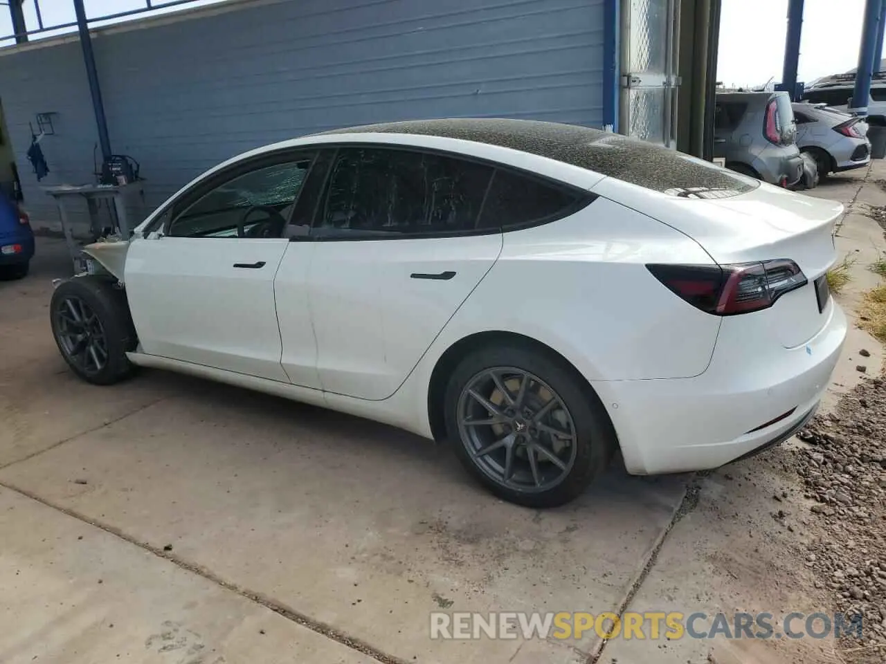 2 Photograph of a damaged car 5YJ3E1EB9NF350010 TESLA MODEL 3 2022