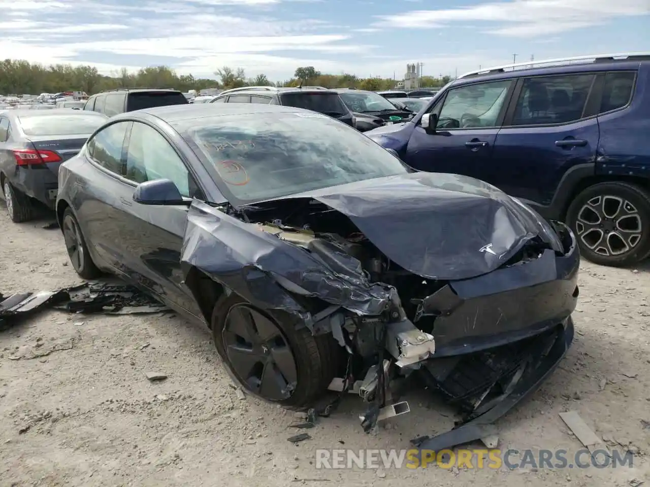 1 Photograph of a damaged car 5YJ3E1EBXNF108133 TESLA MODEL 3 2022