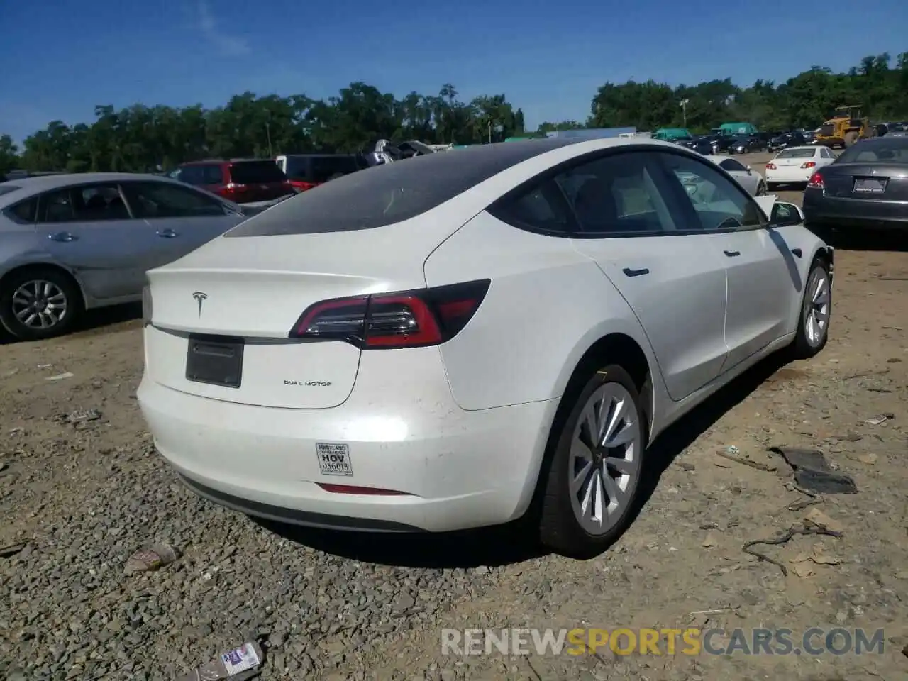 4 Photograph of a damaged car 5YJ3E1EBXNF112215 TESLA MODEL 3 2022