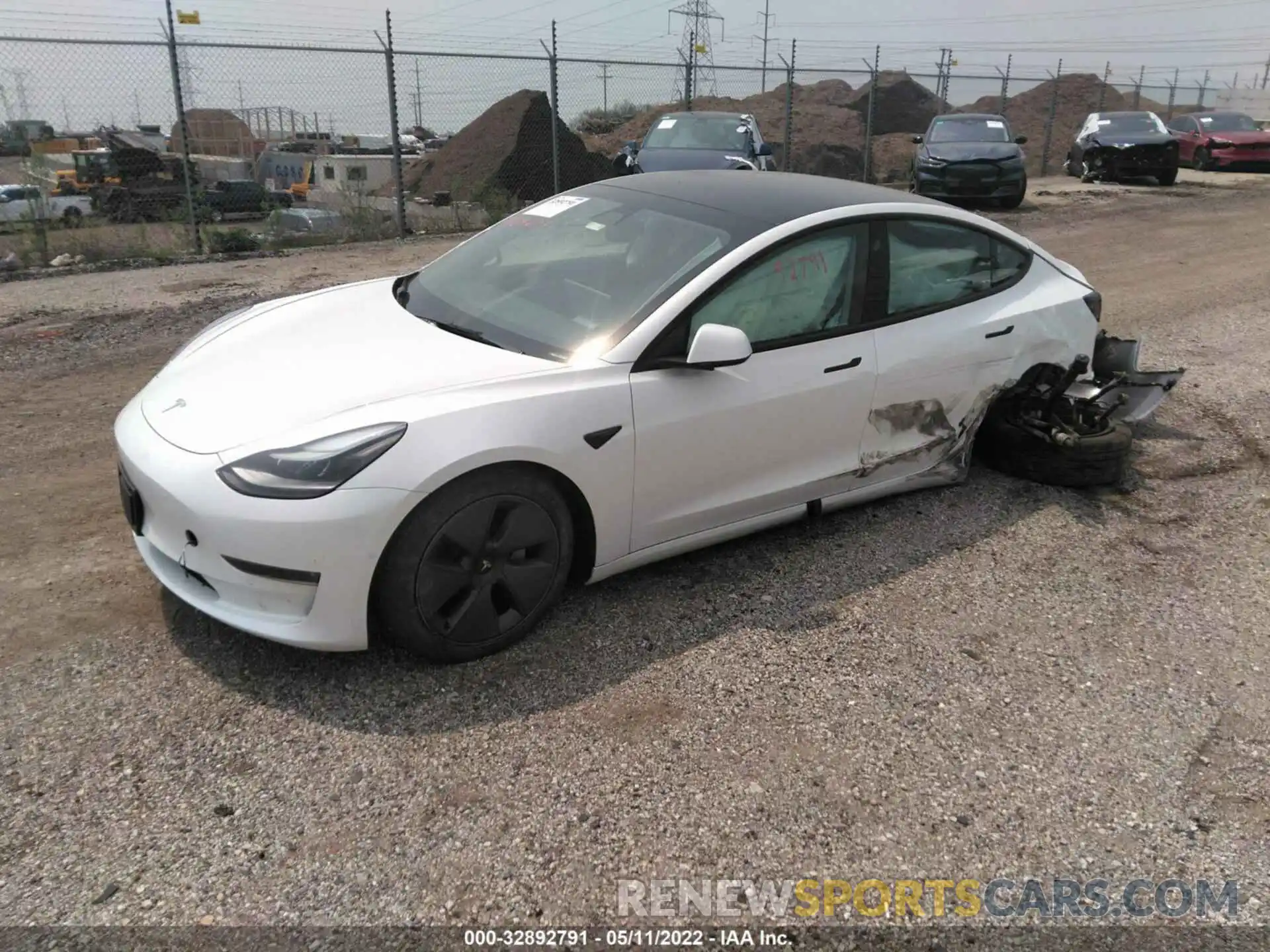 2 Photograph of a damaged car 5YJ3E1EBXNF128284 TESLA MODEL 3 2022