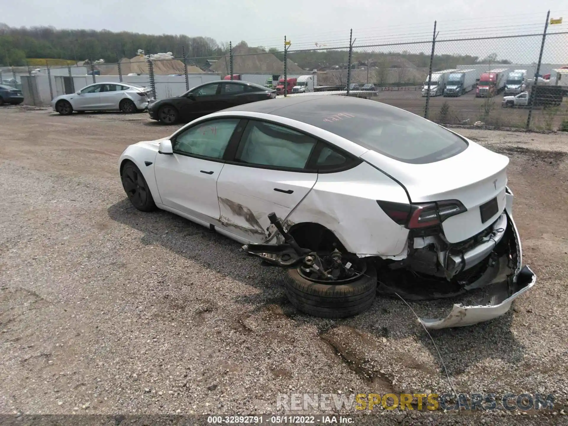 3 Photograph of a damaged car 5YJ3E1EBXNF128284 TESLA MODEL 3 2022